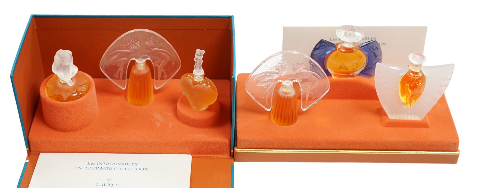 Two Lalique sets of three miniature perfume bottles. 'Les flacons miniatures' 1996-1997 and 1998-2000, boxed and sealed, tallest 7cm high. Condition - good